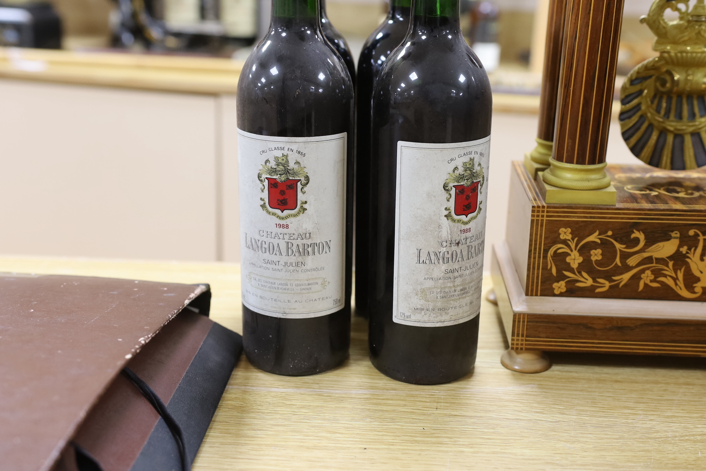 Five bottles of wine: two bottles of 75cl 1988 Chateau Langoa Barton Saint-Julien, one bottle of 75cl 1995 and one bottle of 75cl 1999 Château Leoville Barton Saint-Julien, and one bottle of 75cl 2000 Château Hortevie Sa